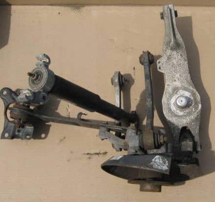 zwrotnica-lewa-wahacz-amortyzator-tyl-saab-9-3-93-ed-car.pl