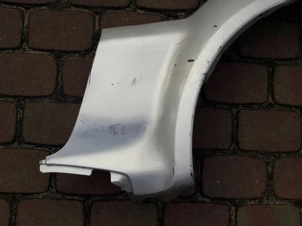 suzuki-jimny-iii-listwa-blotnika-lewy-tyl-98-12-77650-81a00-ed-car.pl-4889729