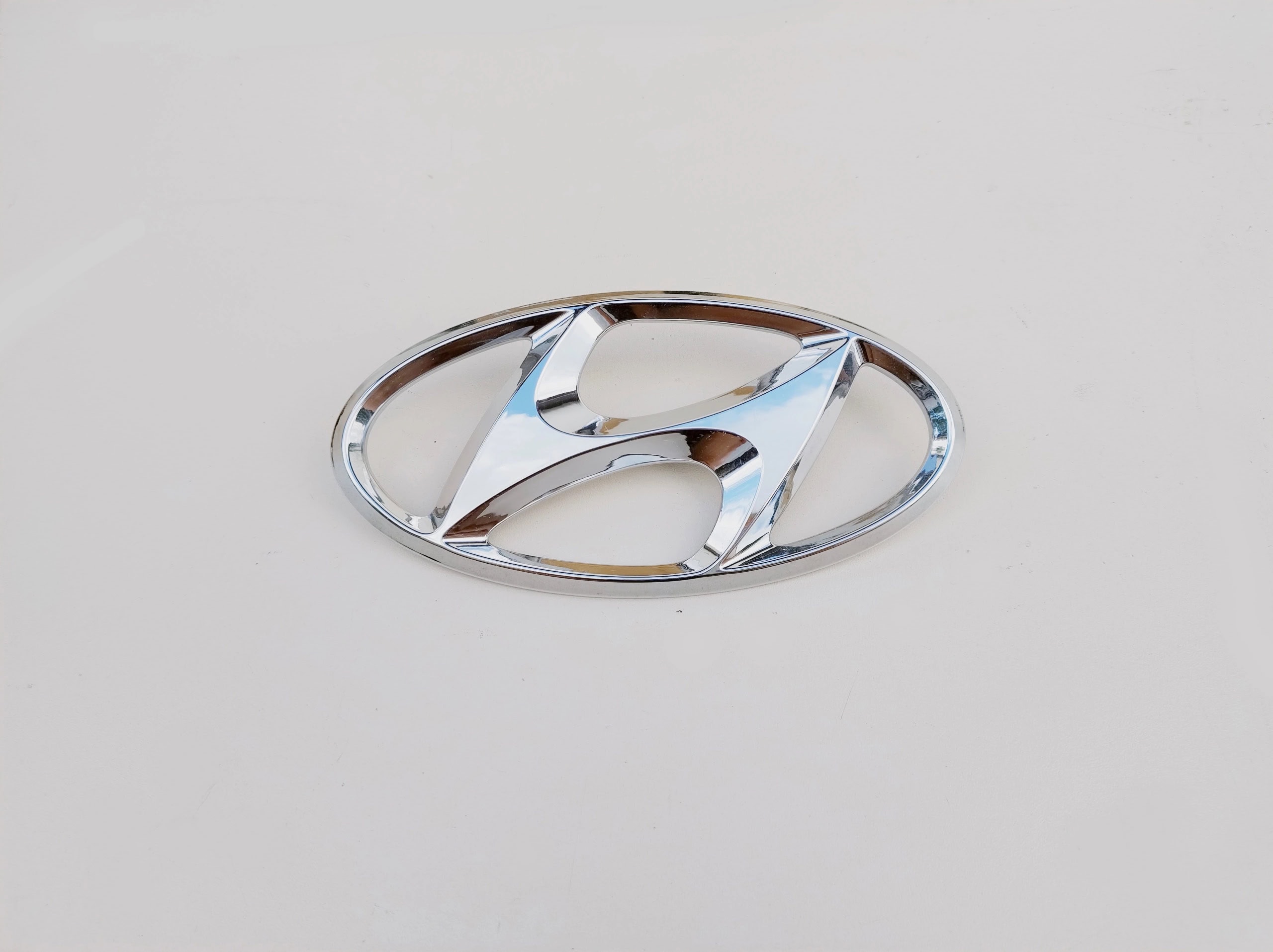 hyunda-ix20-emblemat-znaczek-atrapy-grilla-10-15-86300-1k000-ed-car.pl-6929337