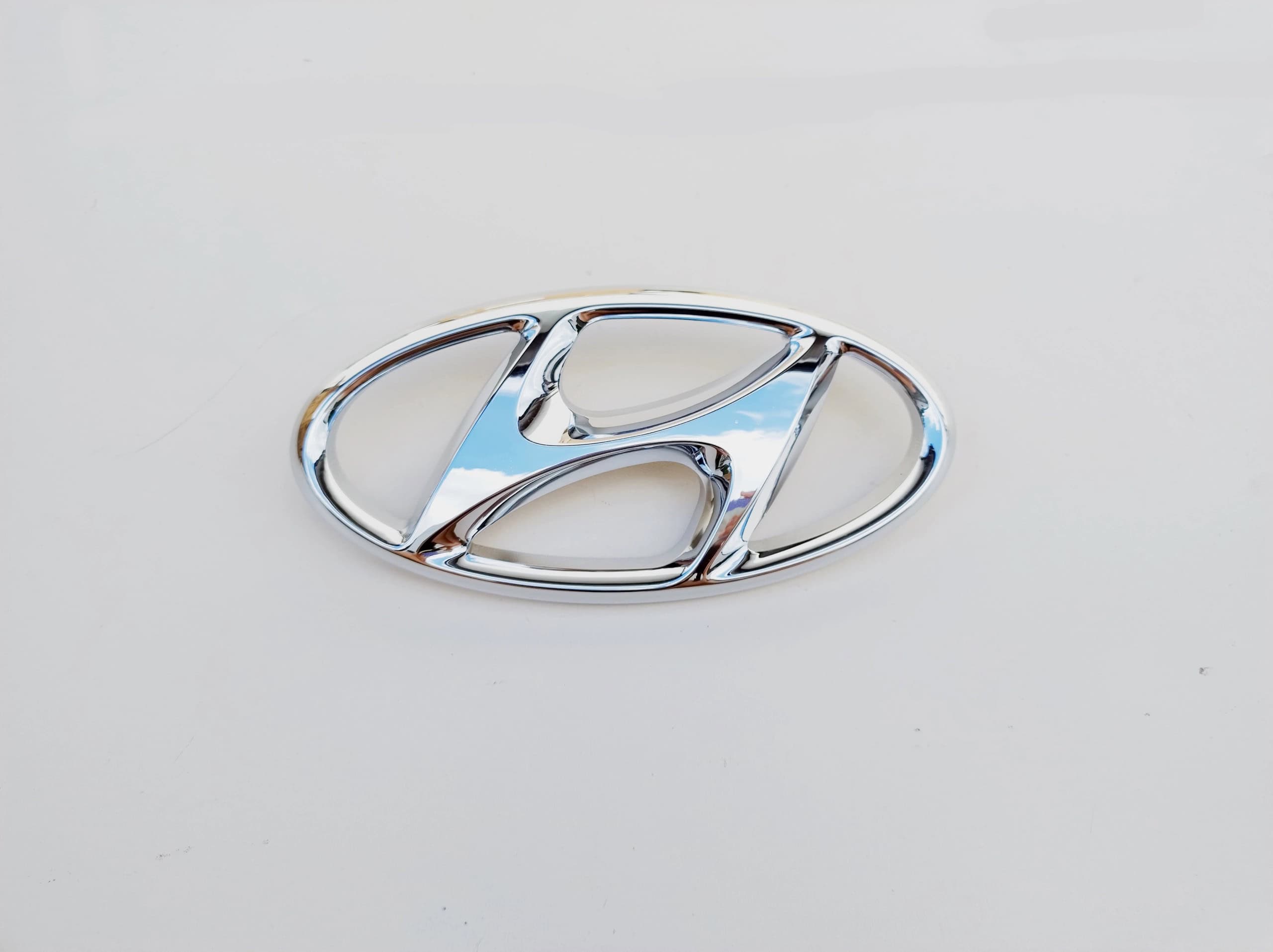 hyundai-i30-ii-emblemat-znaczek-atrapy-grilla-11-14-86353-a5000-ed-car