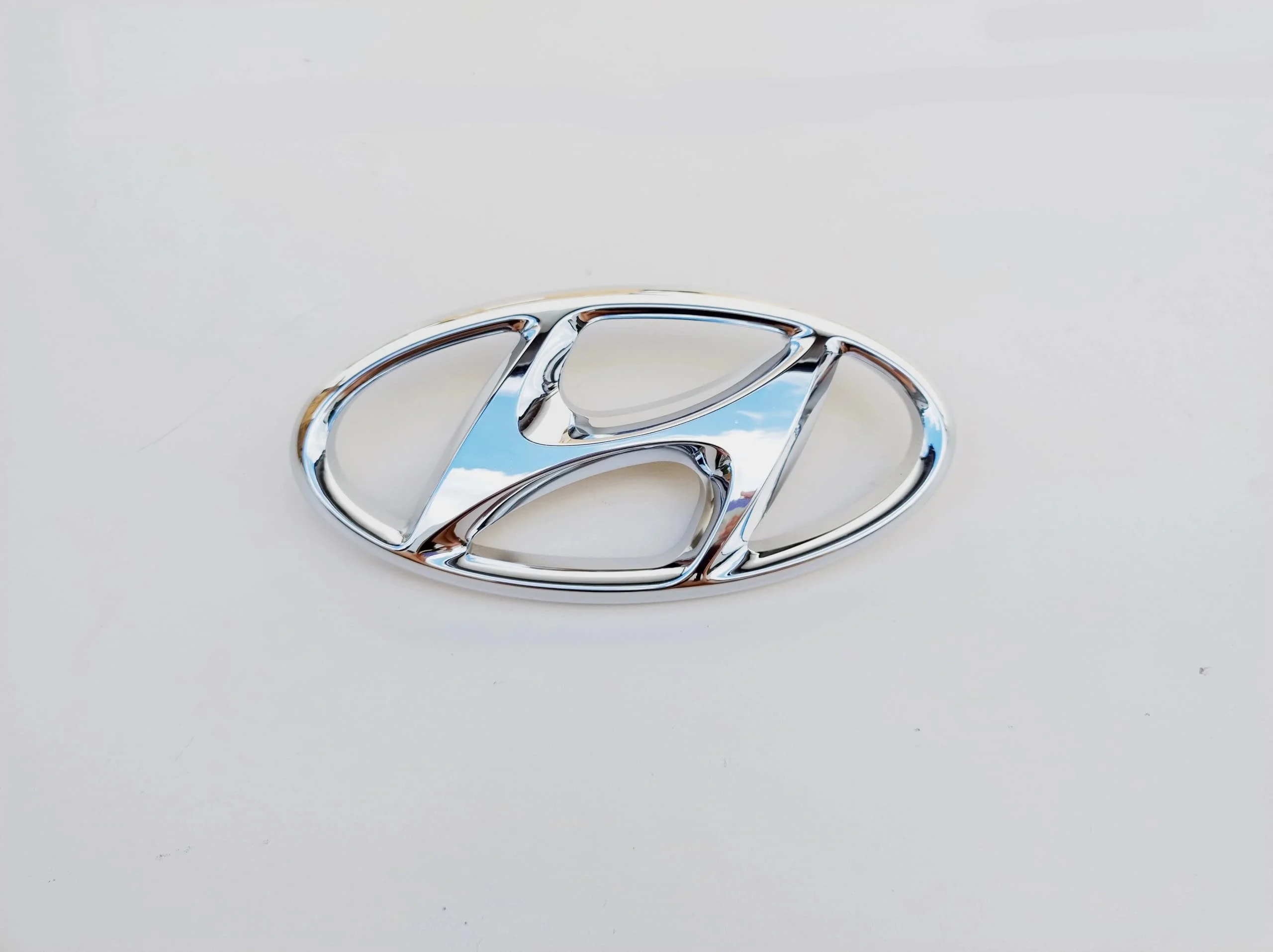 hyundai-i30-ii-emblemat-znaczek-atrapy-grilla-11-14-86353-a5000-ed-car.pl-6929064