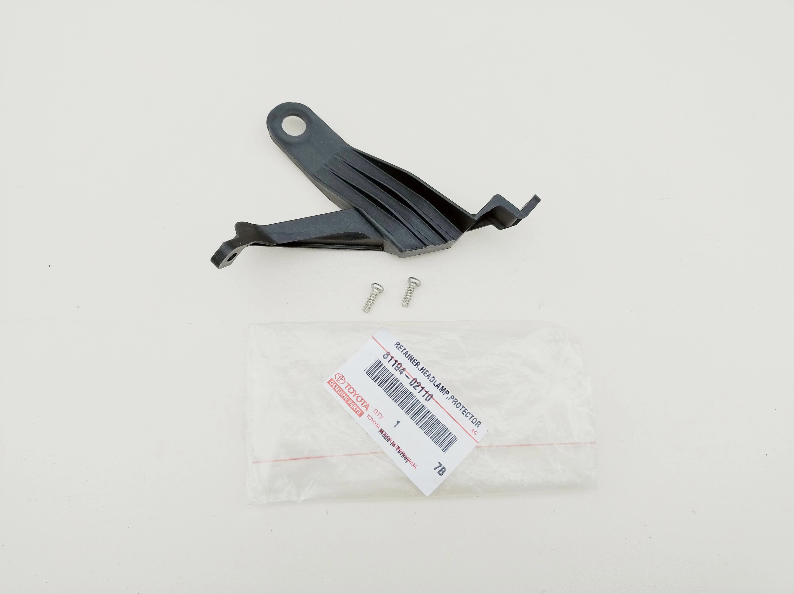 corolla-xi-e16-e17-e18-uchwyt-lampy-reflektora-lewy-przod-81194-02110-ed-car.pl-6920094