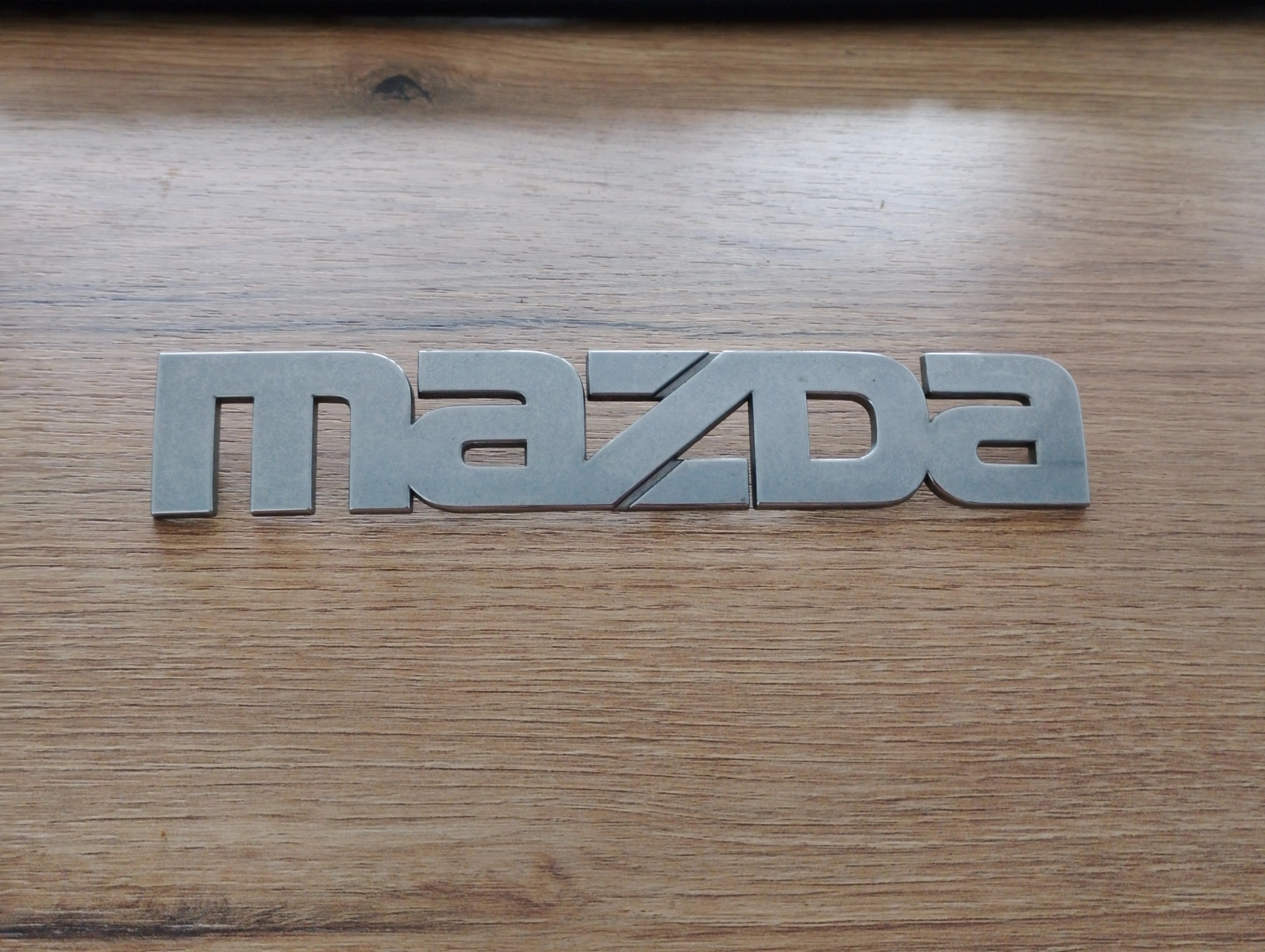 mazda-mpv-znaczek-emblemat-logo-klapy-tyl-00-06-lc6351710-lc63-51-710-ed-car.pl-4888933