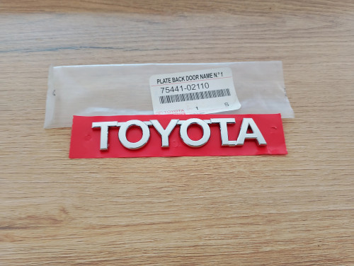 toyota-auris-znaczek-emblemat-lewy-klapy-tyl-07-18-a75441-02110-75441-02110-edcar-ed-car.pl-7178595
