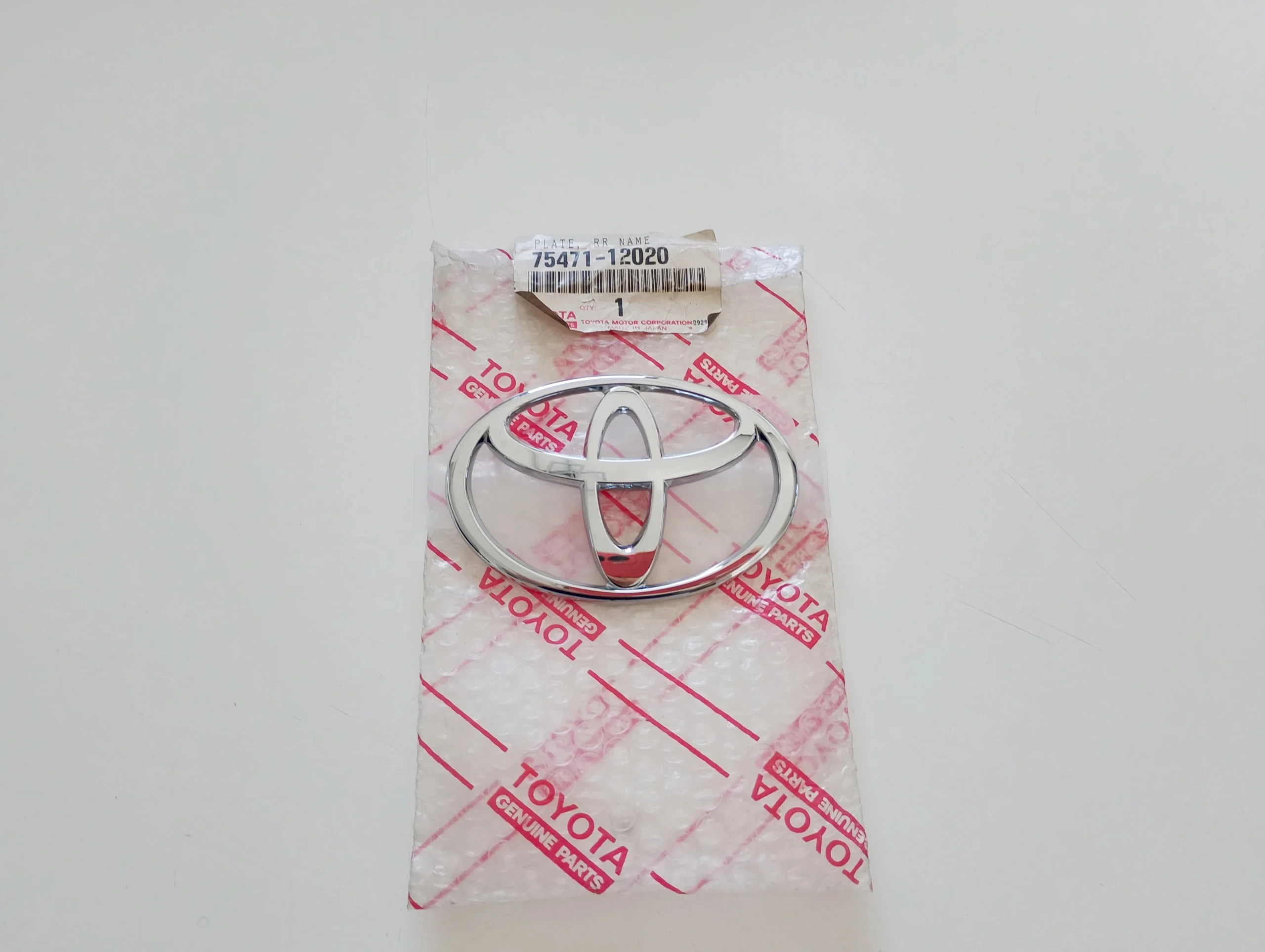 toyota-corolla-e10-znaczek-emblemat-klapy-tyl-92-97-a75471-12020-75471-12020-ed-car.pl-7187786