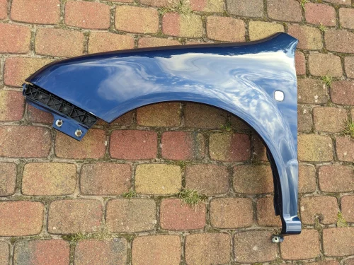 fabia-i-6y0-niebieski-blotnik-slizg-wspornik-lewy-przod-przedni-99-08-6y0-821-101-a-mk1-6y0821101a-ed-car.pl-7301017