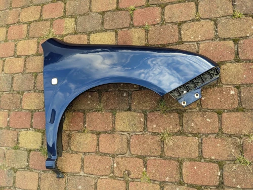 fabia-i-6y0-niebieski-blotnik-slizg-wspornik-prawy-przod-przedni-99-08-6y0-821-102-a-mk1-6y0821102a-ed-car.pl-7300892